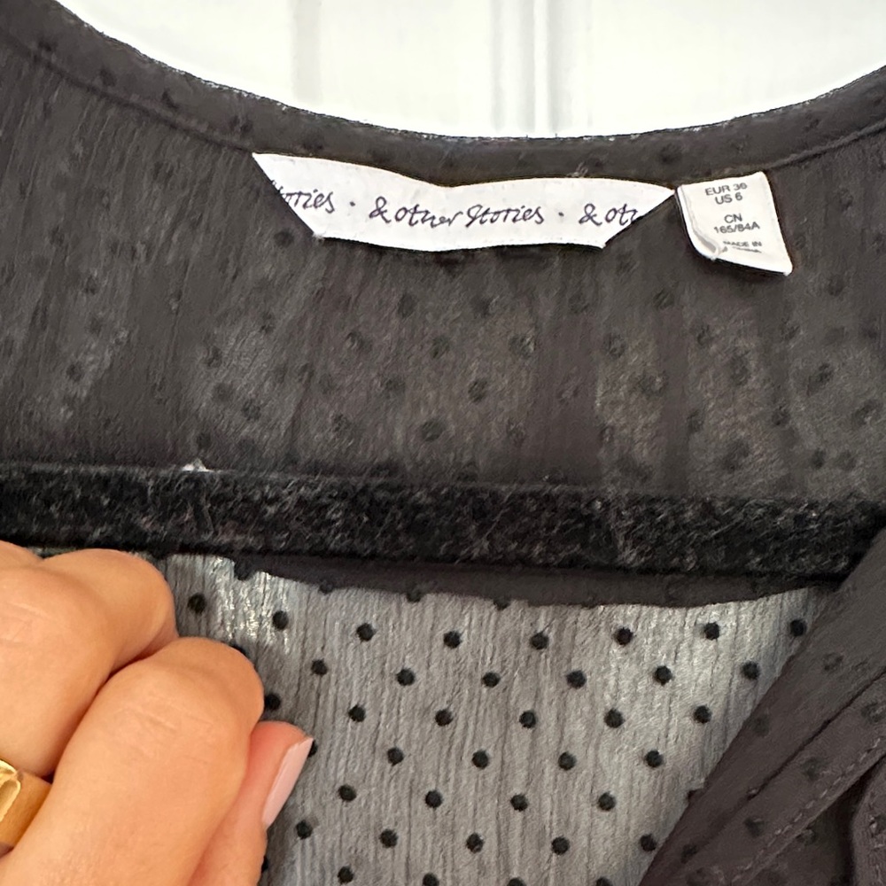 Chic Black Ruffled Blouse - Picture 2 of 3